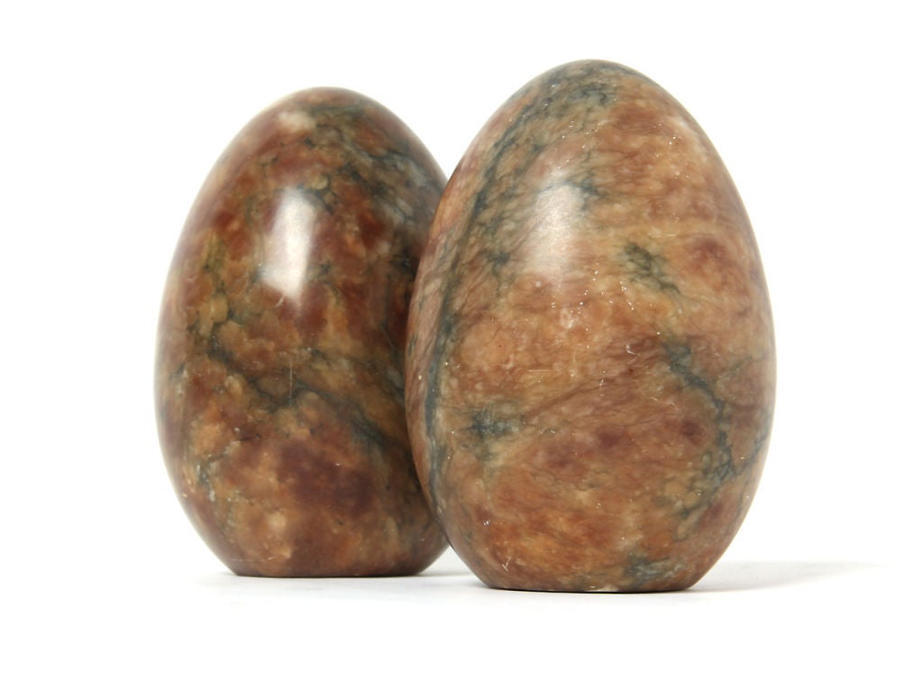 A pair of egg-form marble bookends.
