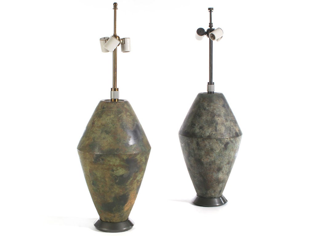 A pair of large corroded bronze table lamps. Hansen Lamps number 141. Priced individually at 7200.00