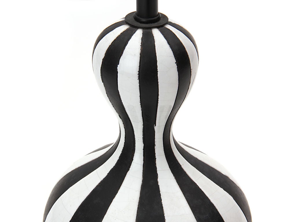 Op-Art table lamp with white glaze and black slip.