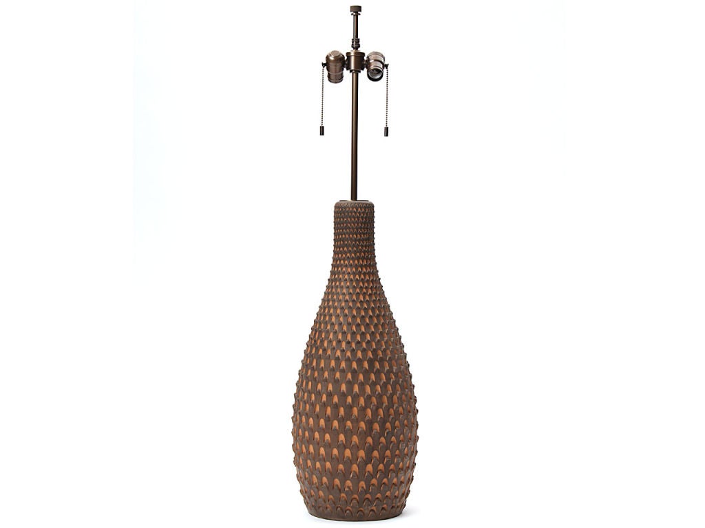 a huge pair of pottery lamps