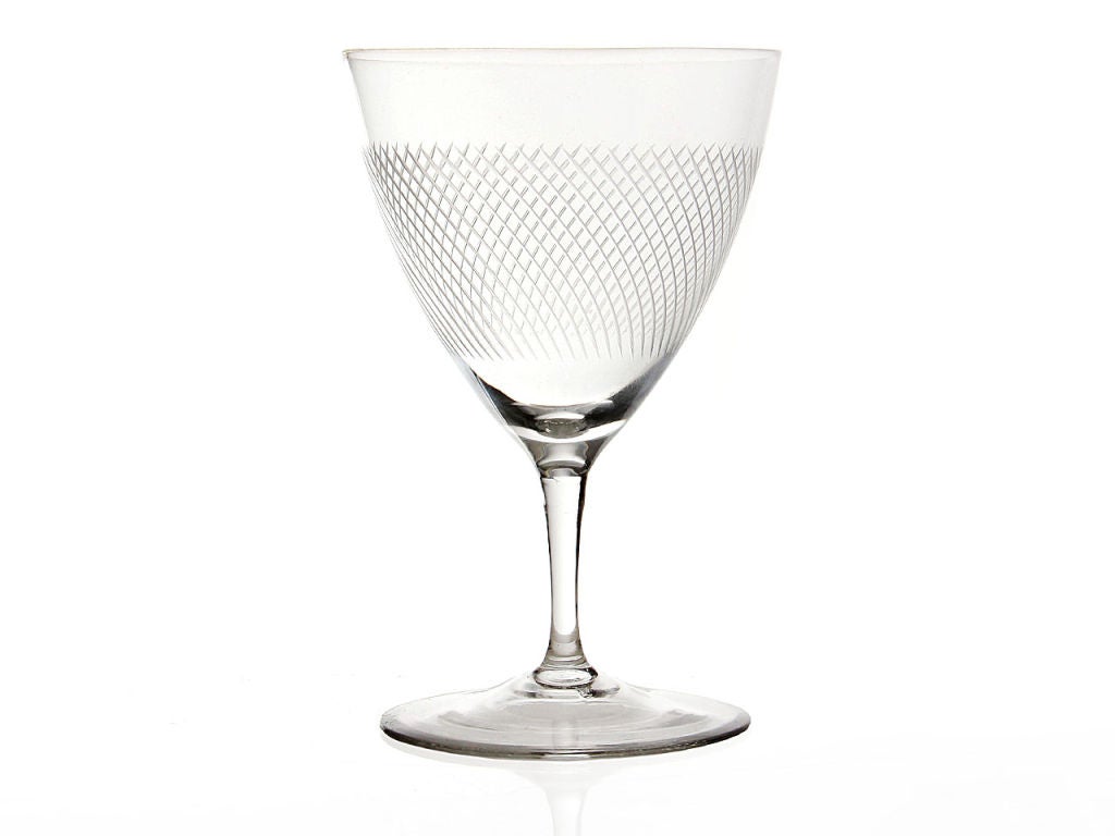 A pair of elegant aperitif glasses in etched leaded glass.