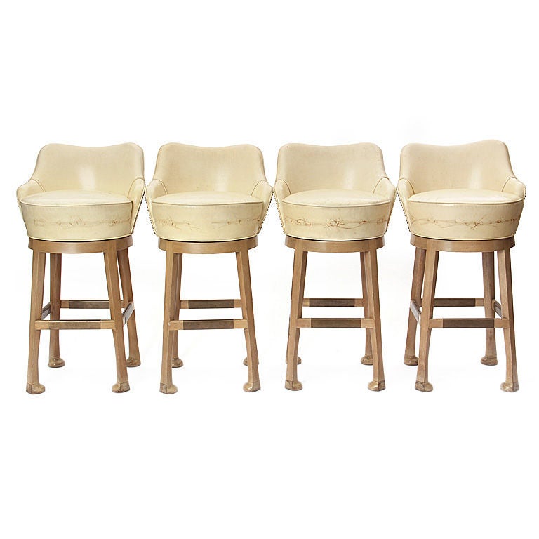 set of four club-foot barstools by Paul Laszlo