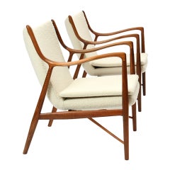 Rare walnut NV-45 armchairs by Finn Juhl