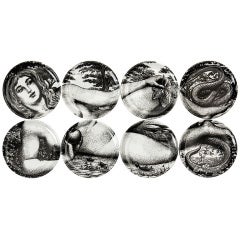 EVA plates by Fornasetti