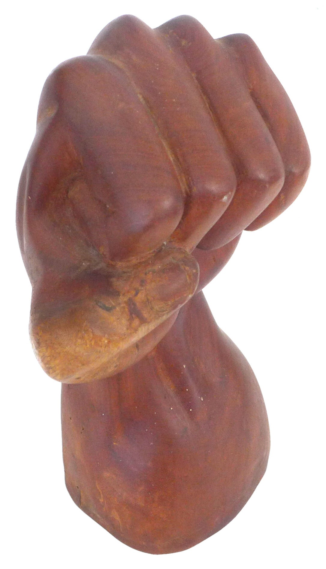 wooden fist statue