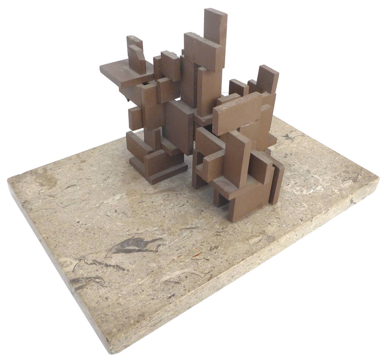 A beautifully architectural sculpture by California artist/architect Jerry L. Pollak.  An assemblage of small clay tablets of various sizes clearly erected to evince a modernist edifice.  An artful architectural-model.  Piece is affixed to its