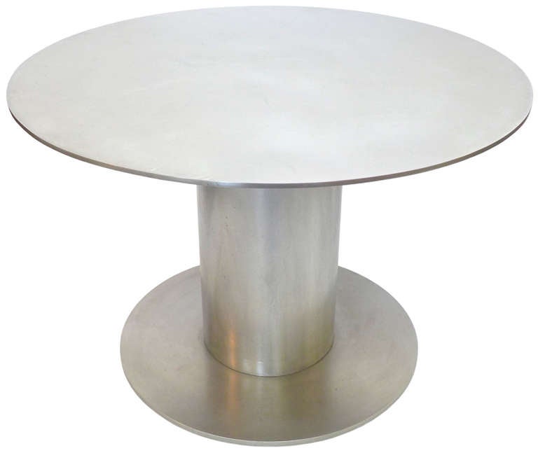A beautifully designed and constructed all stainless steel side table. Heavy-guage steel with wonderful proportions. Likely a custom made piece. Extremely heavy and well made. A very simple yet dramatic form.
