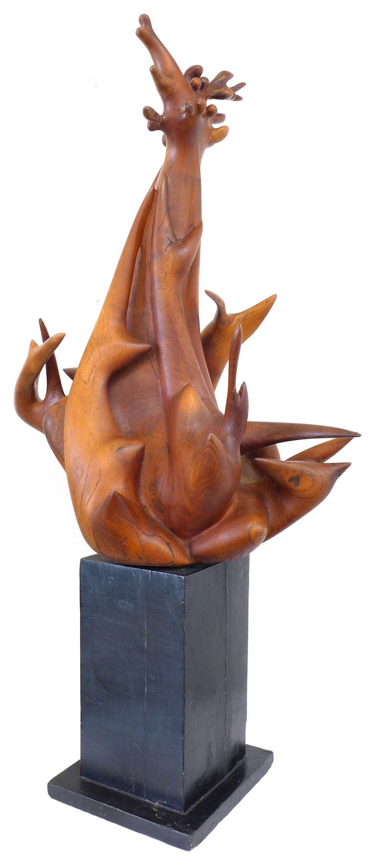 A striking carved-wood sculpture by New York artist Robin Spry Campbell (1922 - 2012).  Campbell attended Skidmore College, studying arts education before joining the US Army in 1943, where her artistic talents were put to use for weapon design - an