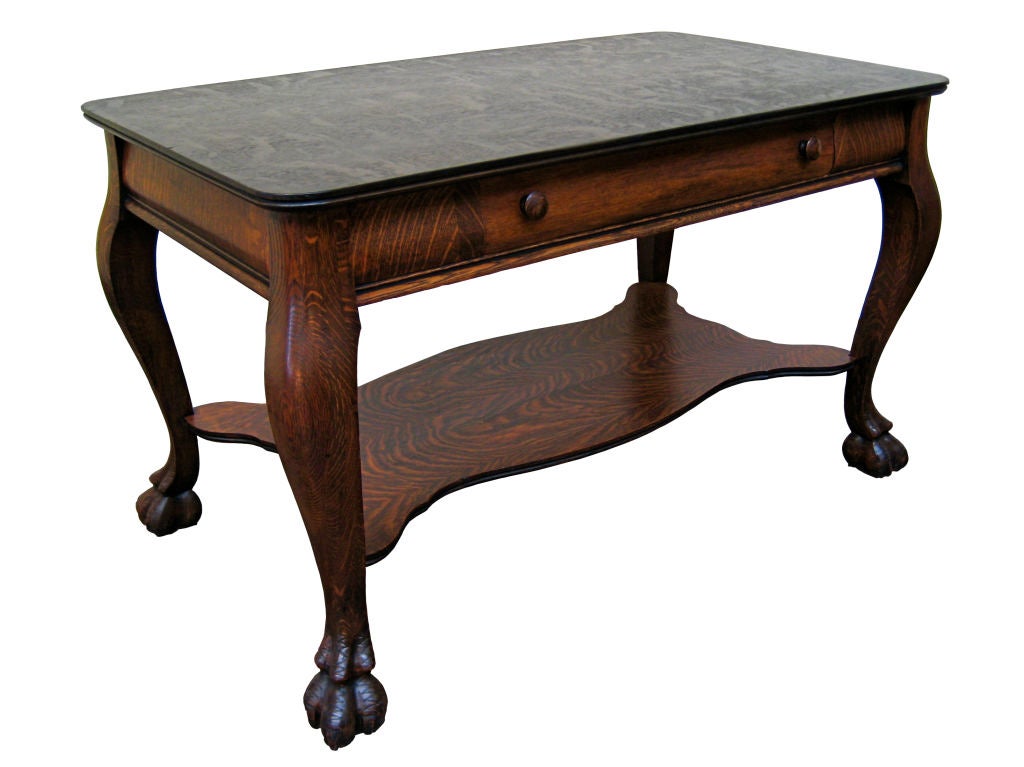 Elegant Tiger Oak console that could also be used as an occasional writing desk.