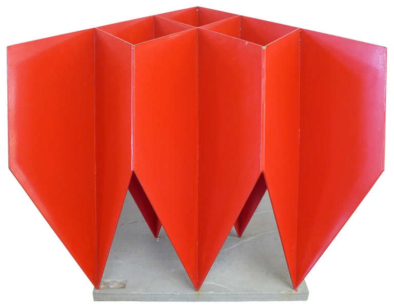 A striking modernist welded-steel sculpture by Israeli-native artist Ephraim Peleg.  A beautifully executed, large geometric form of fantastic scale, offering a variety of appearances from all angles.  True to his common technique of  painting