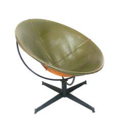 Iron and leather sling swivel chair