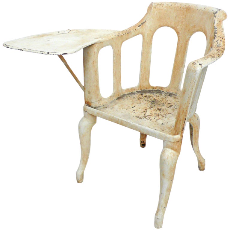 Exceptional Early 20th Century Cast Iron Chair with Paddle Arm For Sale