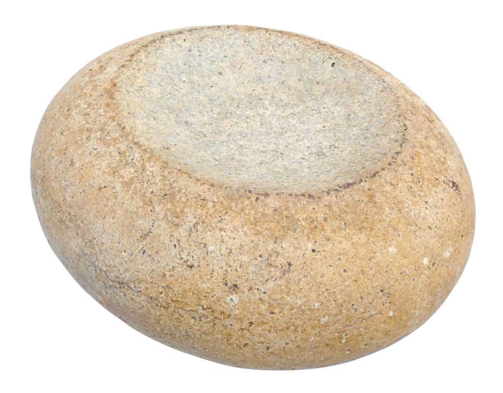 Exceptionally beautiful example of a Native American grinding stone or mortar found in the American West. This hand carved 