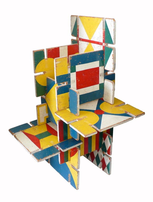 Fantastic, geometrically hand-painted plywood children's toy. Handmade, notched, stackable plywood-panels with colorful 2-sided patterns, this wonderfully sculptural and colorful piece of modernist folk art brings to mind the Eames 