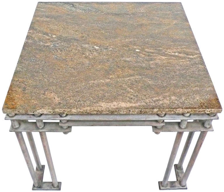 Beautifully designed and constructed, tubular and flat-band steel side tables with striking polished-granite tops. Strong architectural lines recalling the American Machine Age design aesthetic. Very graphic and commanding forms which manage to