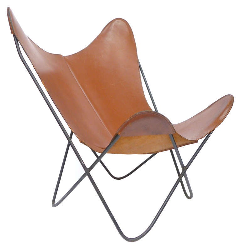 Originally designed in 1938 by Jorge Ferrari-Hardoy, the Butterfly chair is certainly among the most ubiquitous mid-century designs. Constructed of rod-steel and leather, the Hardoy chair was produced by Knoll from 1947-1973. This particular chair