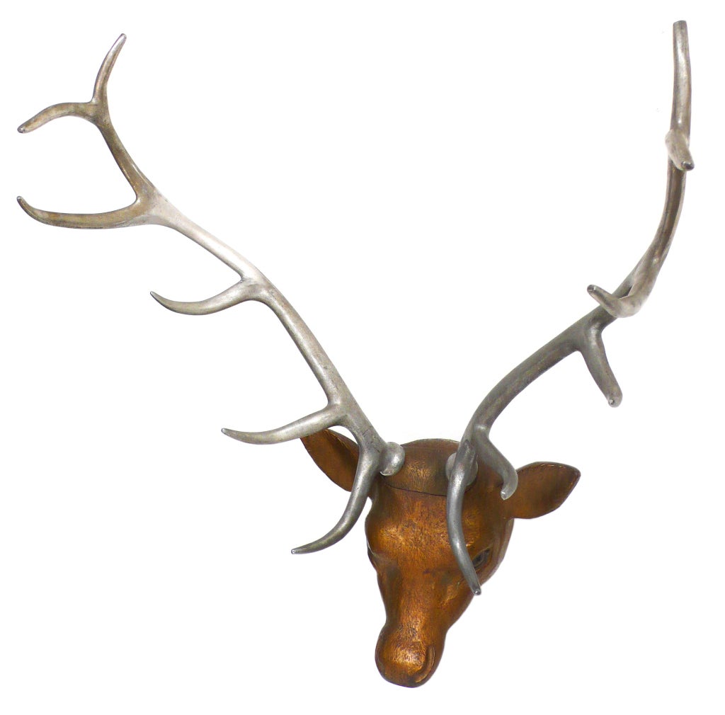 This wonderfully detailed, cast-iron and aluminum elk head came out of a lodge in Zanesville, Ohio. It is large and beautifully detailed, including inset glass eyes. A fantastic and unusual decorative object that is both traditional and modern.