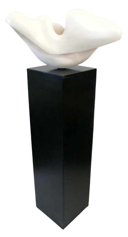 A wonderfully biomorphic, painted plaster sculpture on it's original artist-made pedestal. A really fantastic, flowing form with open-interior work, creating an exotic and alluring sculptural statement.
Sculpture (alone) dimensions:  13