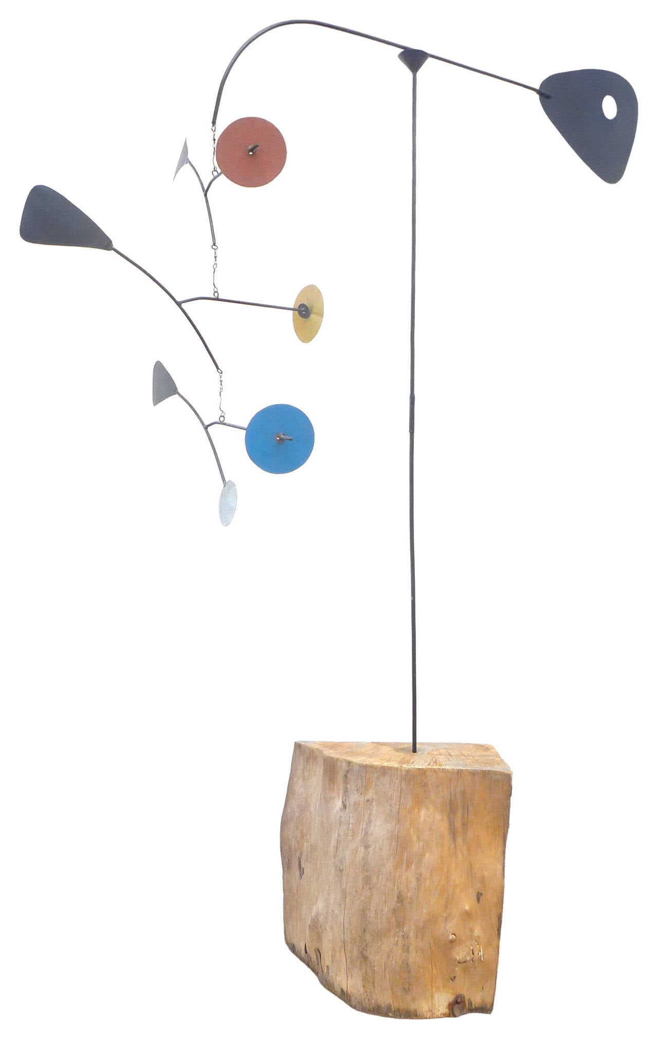 A spectacular, completely handcrafted standing mobile of great scale and execution. In the spirit of Calder, a beautifully balanced piece with fantastic, warm colors and a much-desired patina throughout. Wonderful details including a perforated