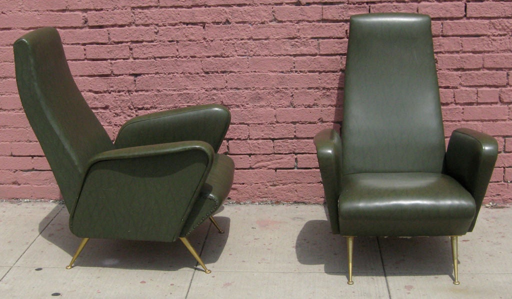 Pair of mid-century green italian armchairs. Original vinyl upholstery.