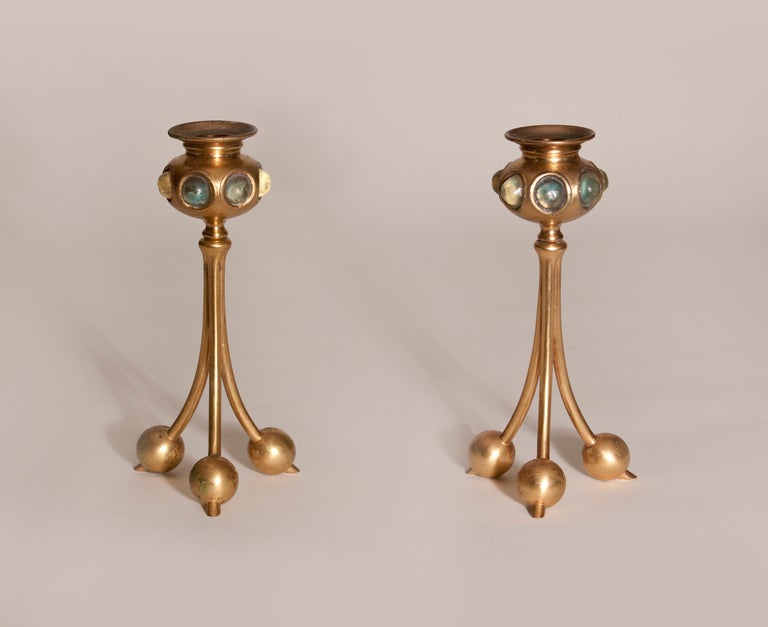 A pair of Tiffany Studios gilded bronze Turtle Back Candlesticks, signed. At the time of production an additional charge of 25% was charged by Tiffany Studios for the gilded finish. 