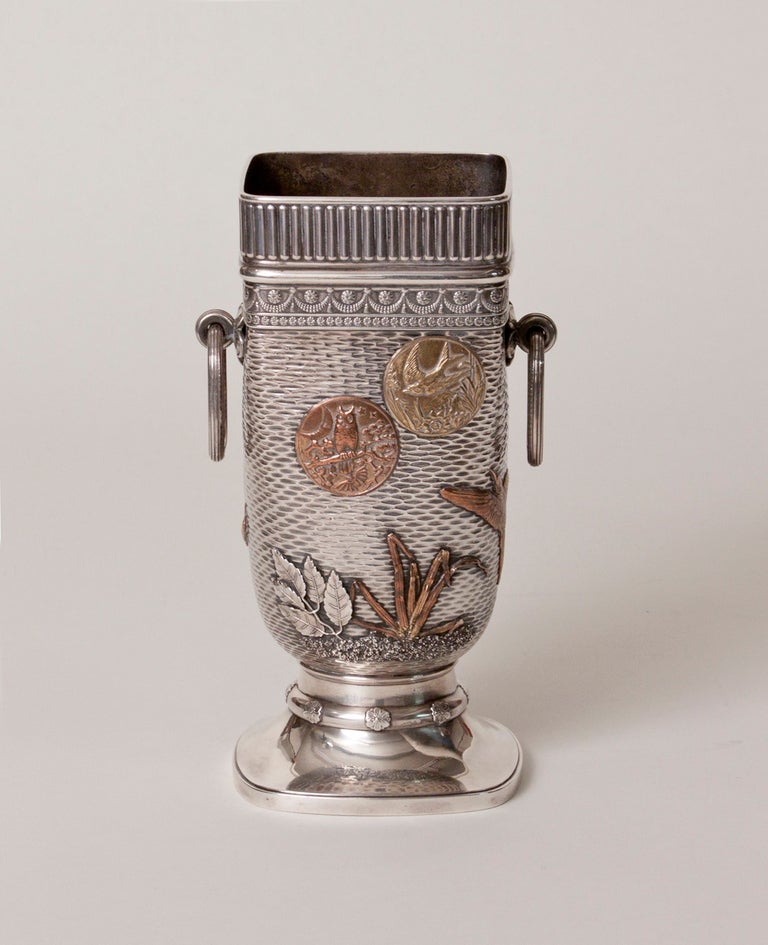 A Gorham Manufacturing Company Silver and Mixed Metal Vase, signed and dated. Another example of this vase is in the permanent collection of the Metropolitan Museum of Art, New York.