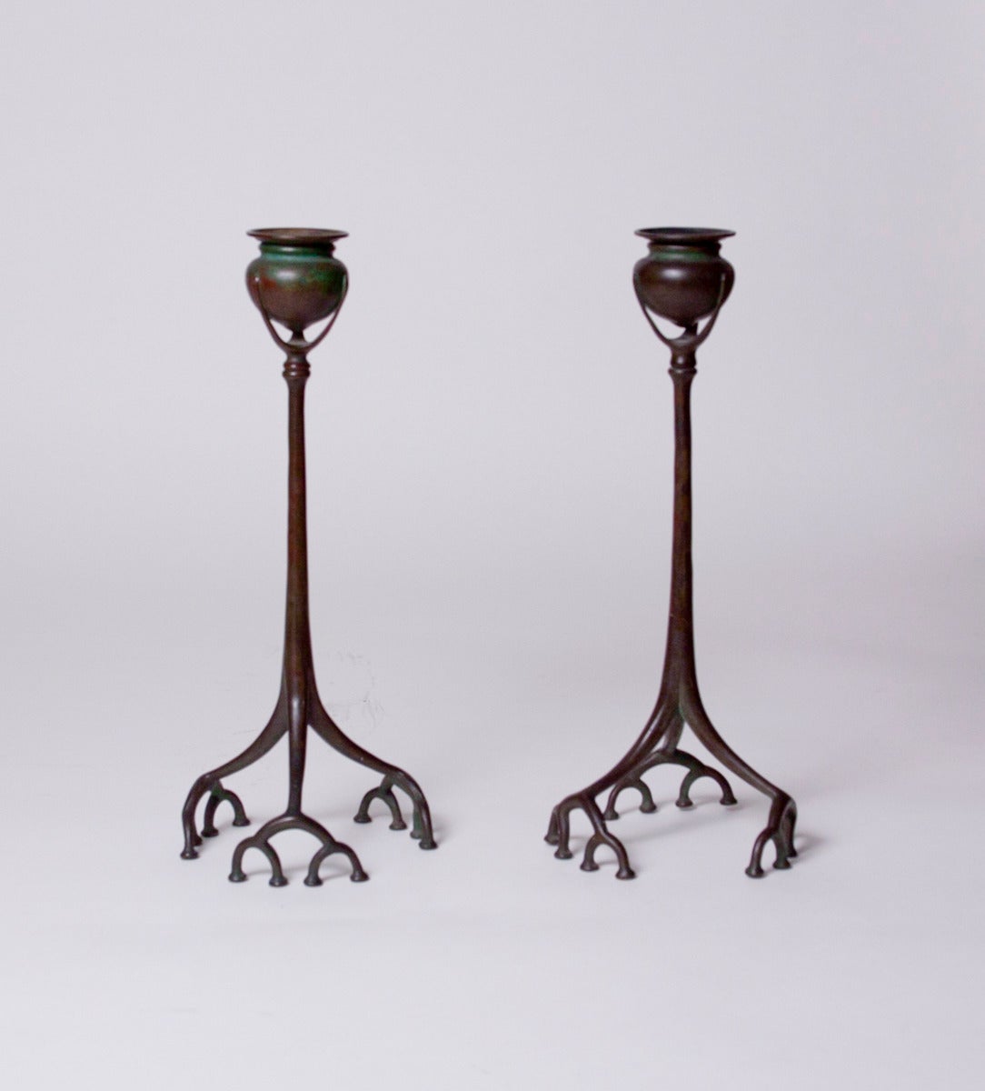 A pair of Tiffany Studios bronze 