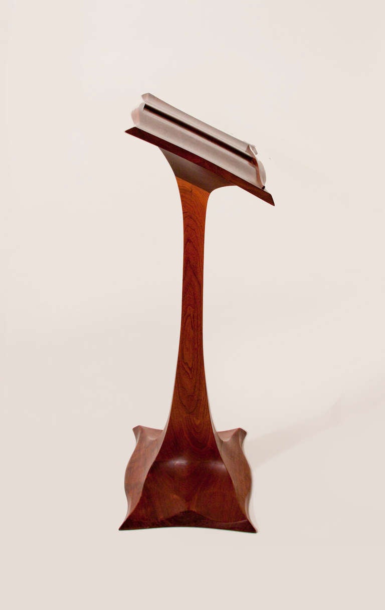 A music stand or lectern in walnut by New Hope artist Robert Whitley circa 1970, signed.