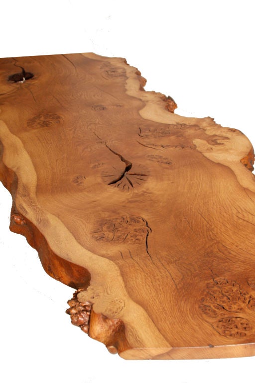 An English Burl Oak George Nakashima coffee table with a single rosewood butterfly key.