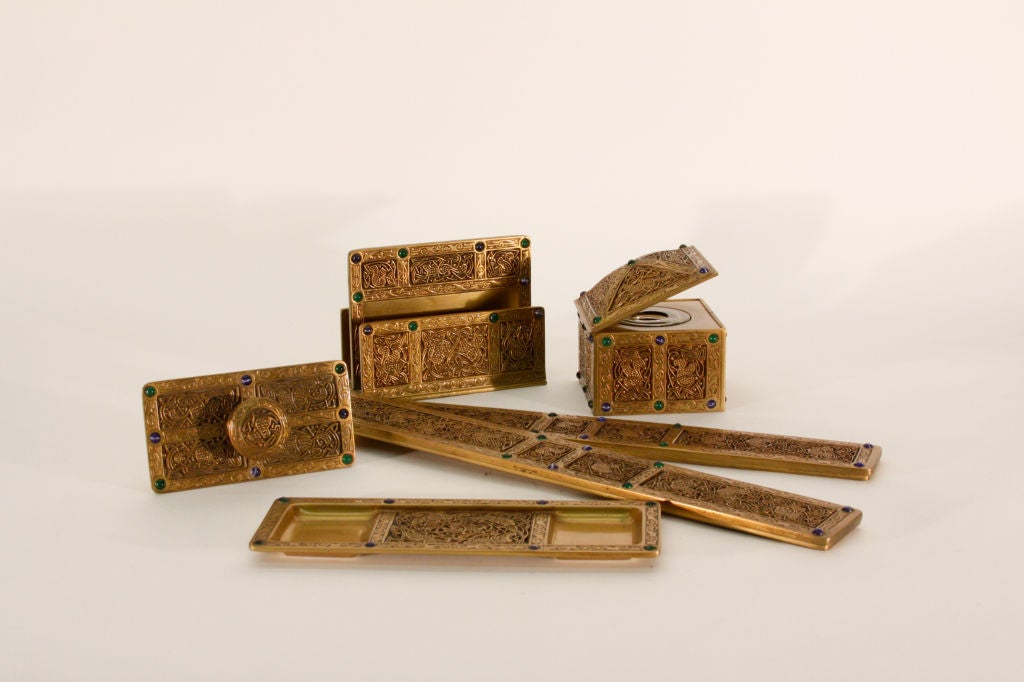 Tiffany Studios desk set comprising blotter ends, pen tray, inkwell, rocker blotter and letter file in the 