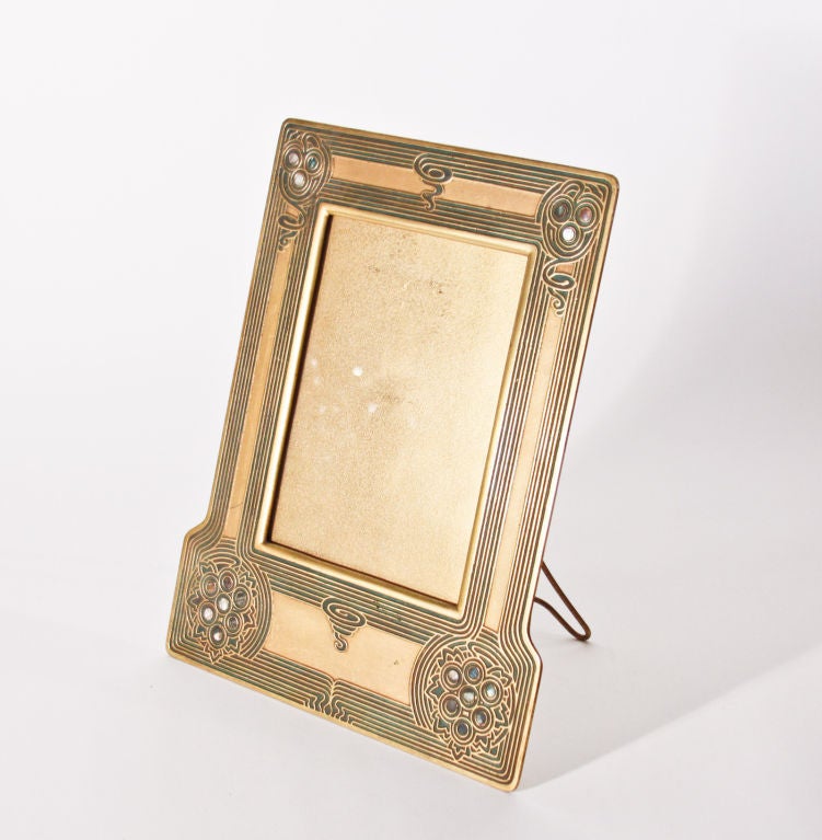 An exceptional Tiffany Studios gilt bronze picture frame in the 