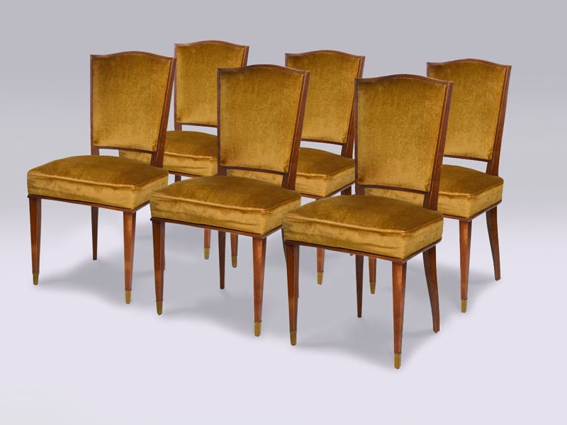 Tinted beech with brass sabots,
French, circa 1945.