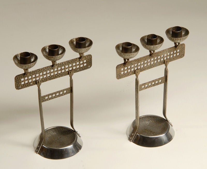 A pair of Art Nouveau/Vienna Secession candlesticks attributed to Hugo Borger.
Hammered steel, stamped 'Goberg' Metallwarenfabrik, Schmalkalden.
Germany, circa 1910.

