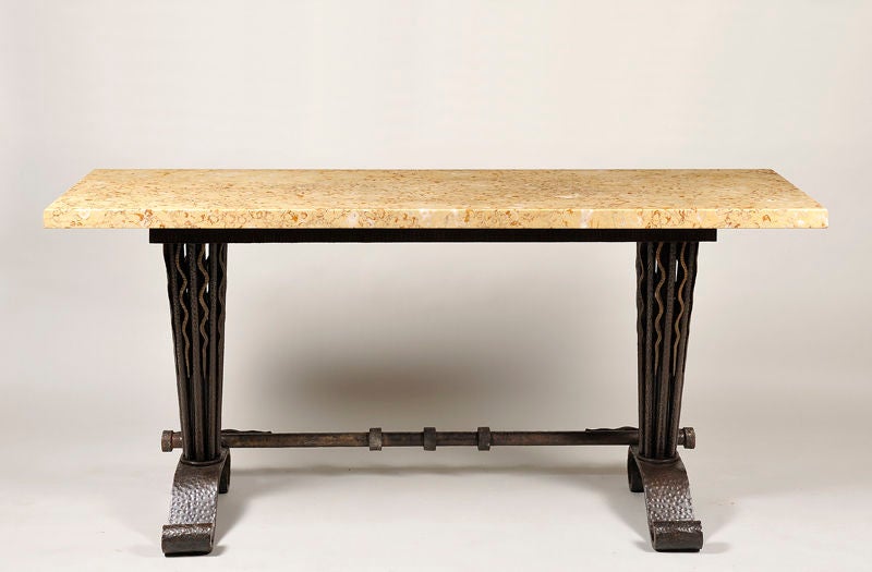 Forged and cast iron with gilt detail. Original slab marble top,
France, circa 1930s.