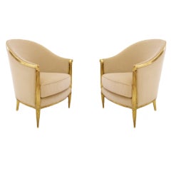 A pair of Art Deco bergeres in the manner of Maurice Dufrene