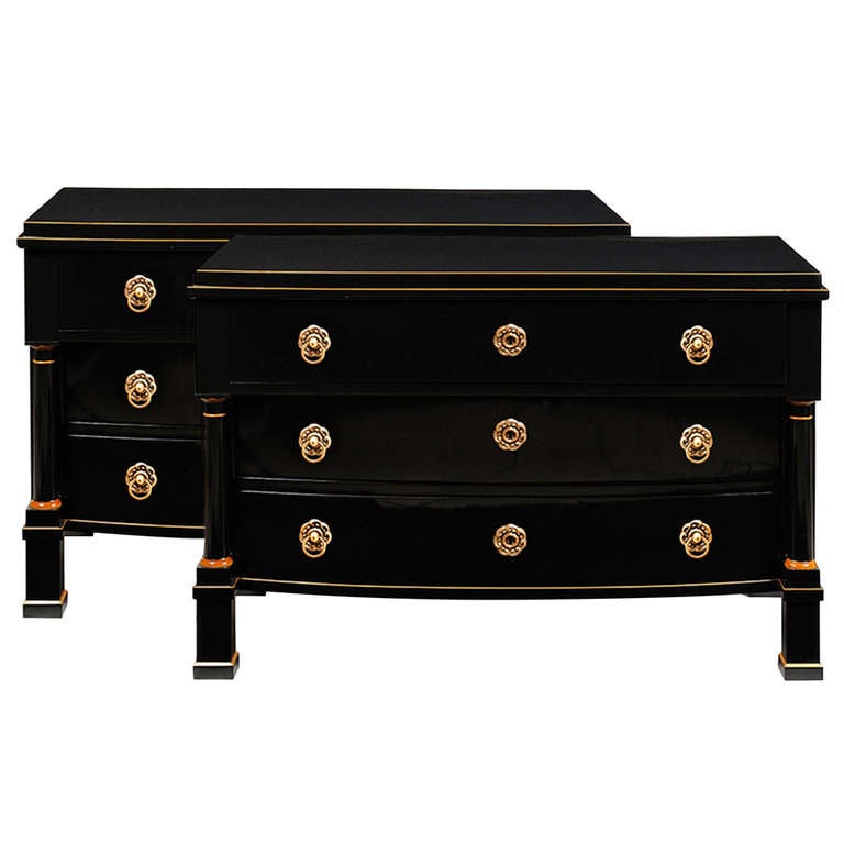 A pair of three drawer Biedermeier chests with flanking Doric columns, block foot, and maple detailing.