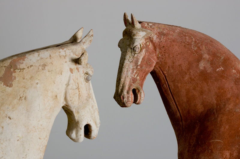 A Pair of Chinese Horse Sculptures