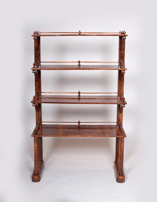 Bookmatched walnut veneer in four tiers.