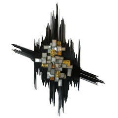 A dynamic brutalist metal wall sculpture c. 1980's.