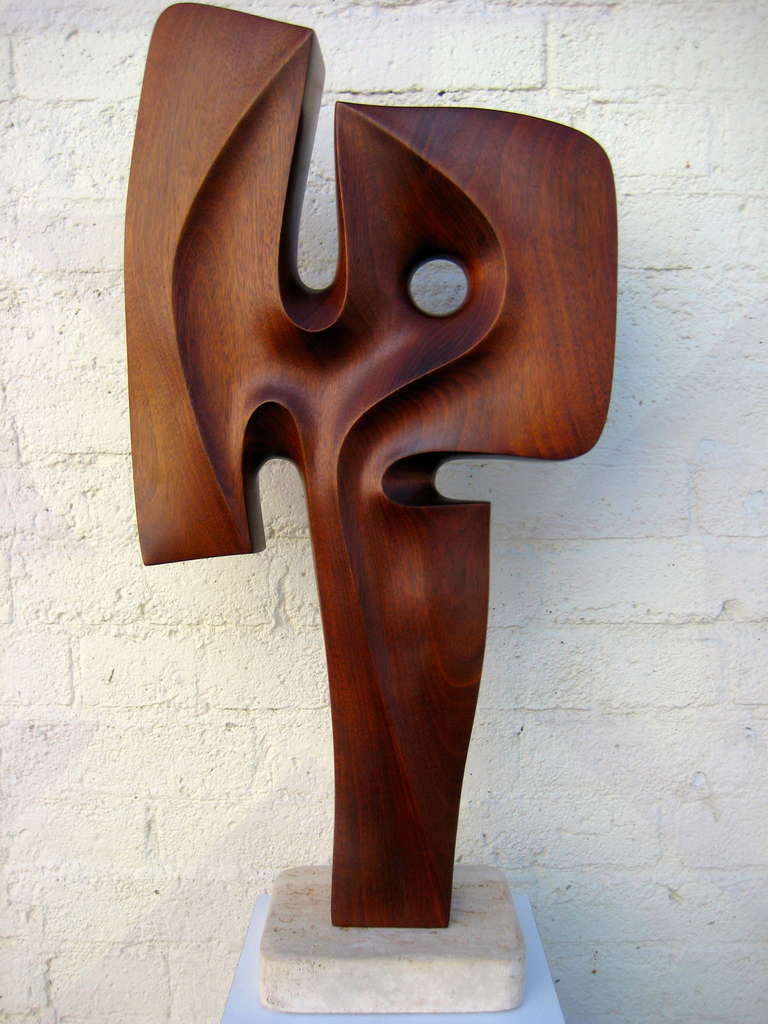 A Seductively Carved 1970's Mahogany Sculpture On Travertine Base. 1