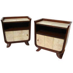 A Pair of Italian Walnut Bedside Cabinets with Parchment Surfaces