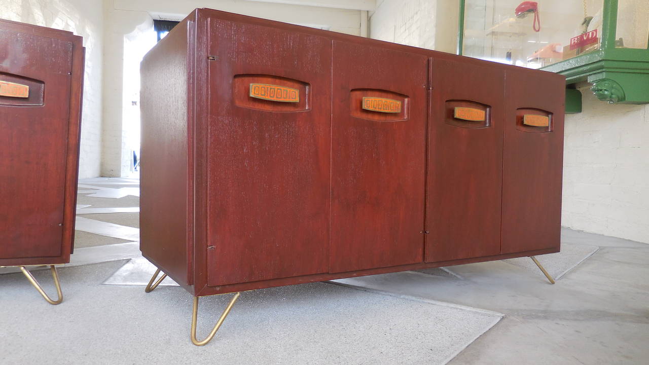 Mid-Century Modern Dynamic Pair of Solid Mahogany Low Cabinets with Enameled Hardware, circa 1950s