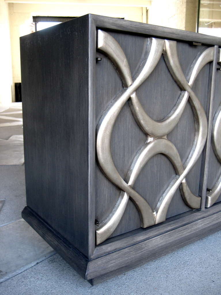 Late 20th Century A 1970s Sculpted Facade Silver Leaf Credenza by American Manufacturer Stanley