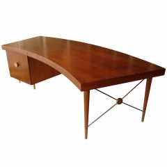 A massive walnut desk in the style of Monteverdi Young