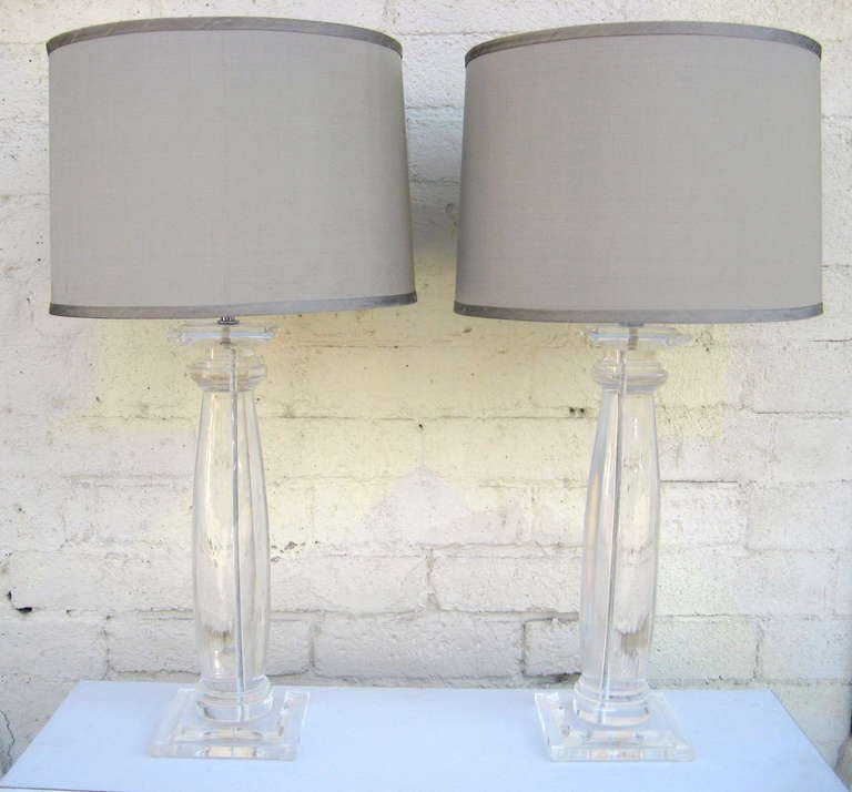 A pair of classic Karl Springer column form acrylic lamps ca. 1970's.
Shades shown with lamps for effect. 
dimensions are for the lamps as shown.
Newly rewired.