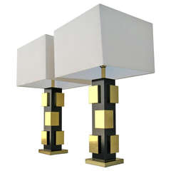 A striking pair of cubist table lamps in black laminate and brass c. 1970
s A striking pair of cubist table lamps in black laminate and brass c. 1970
s