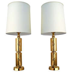 A glitteringly chic pair of gilded 1950's table lamps