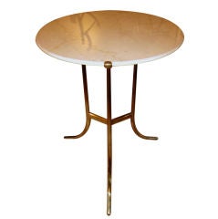 A signed Cedric Hartman tripod table with Botticino marble top