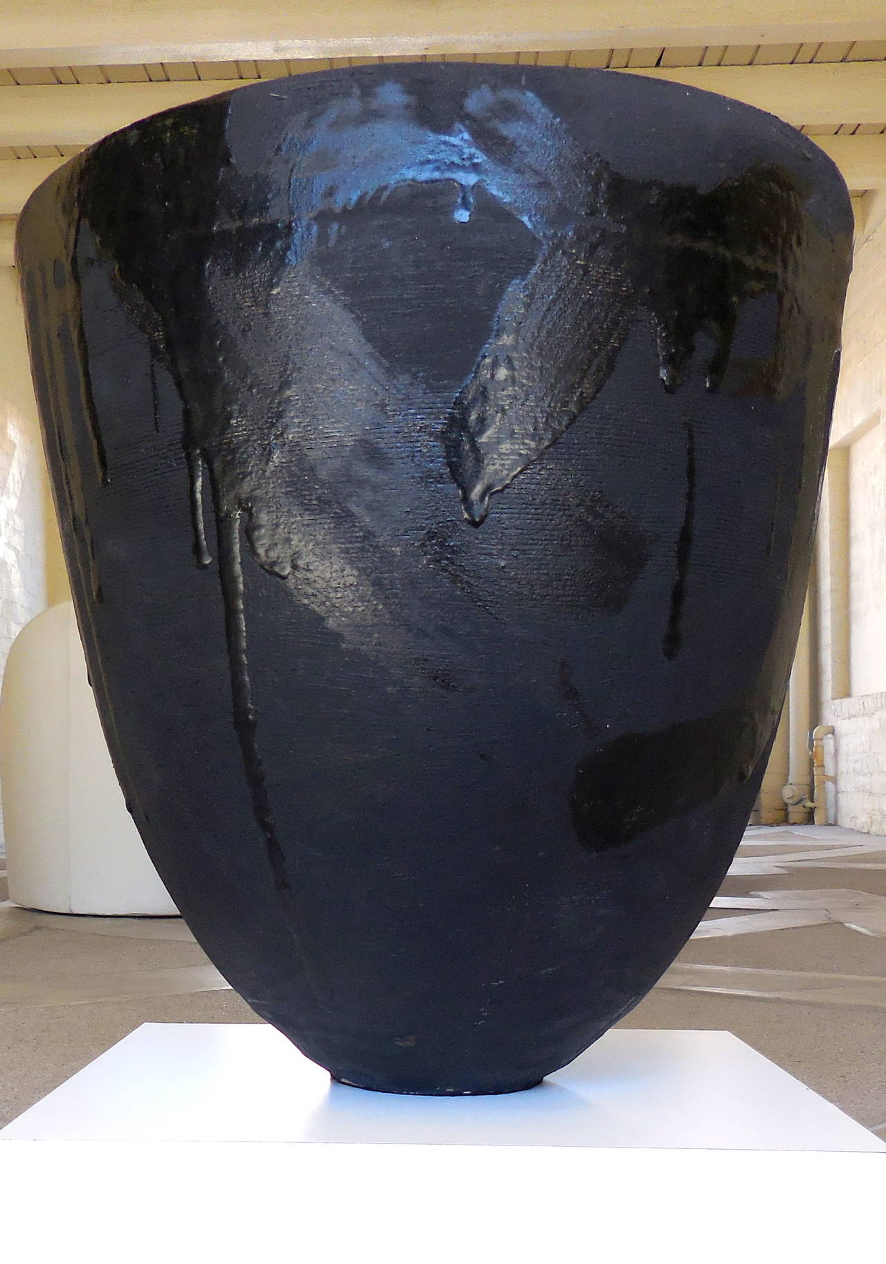 A large-scaled glazed ceramic vessel by American Master Darcy Badiali. Nearly 1 1/2 feet tall, this impressive work of art was fired in the kiln at Cal State Fullerton. This particular vessel is redolent of the amazing pottery of the American