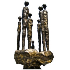 A gilt patinated bronze sculpture of 7 figures by Dale Hallberg C. 1972